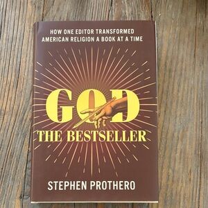Brown and Yellow 'God The Bestseller' Book